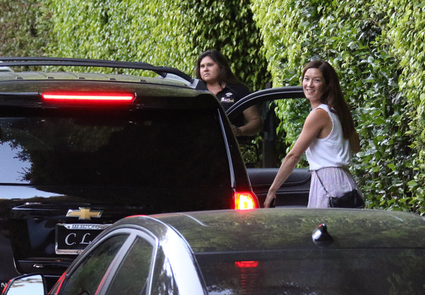 Naomi Nelson spotted getting inside car after Charlize Theron's 40th Birthday Party.