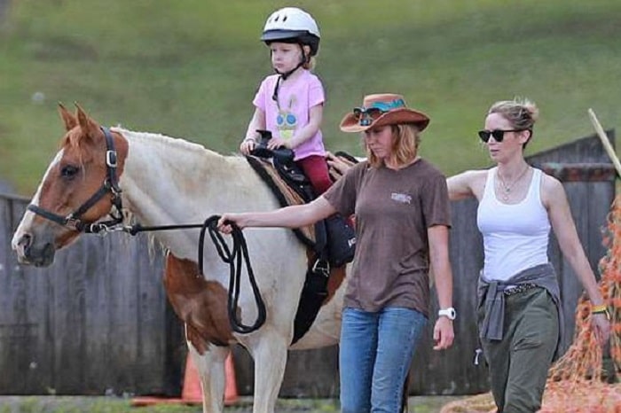 Hazel's quick horse riding session with her mommy.