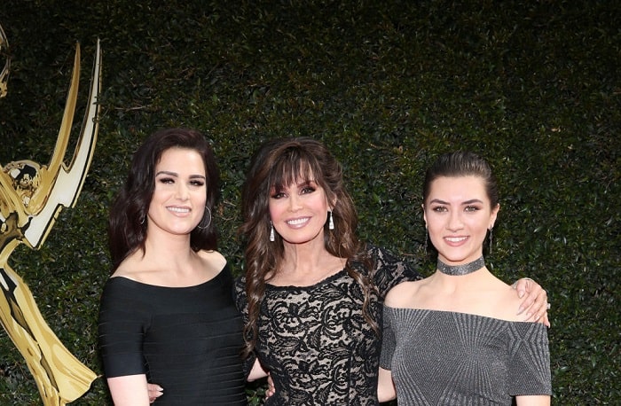Brian's beautiful ex wife and his two daughters.