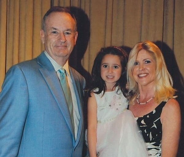 Young Madeline with her parents.