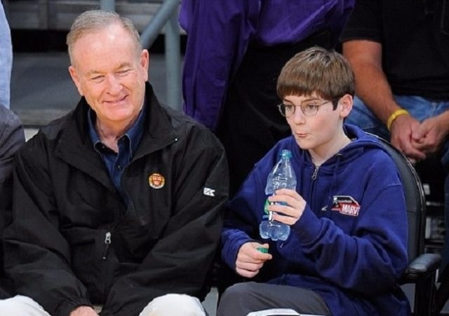 Young Spencer with his father, Bill.