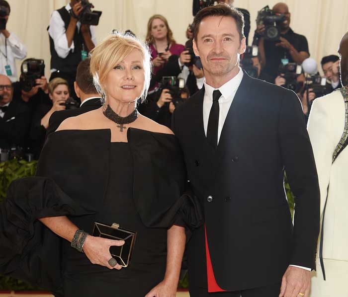 Deborra-Lee Furness and Huge Jackman poses for a photo.