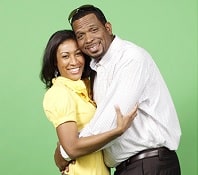 Luther Campbell hugging his wife Kristin Thompson.