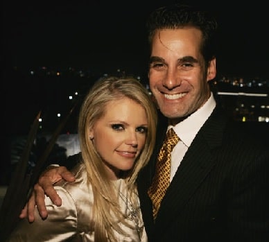 A picture of Natalie Maines's second husband Adrian Pasdar hugging her.