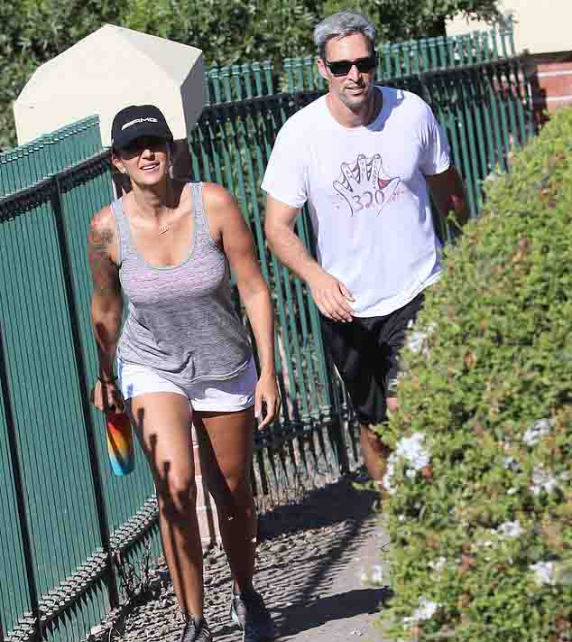 Talinda Bennington and Michael Freidman crossing the street of South Califo...