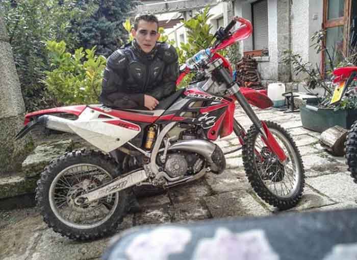 Miguel Herran posing with his bike.