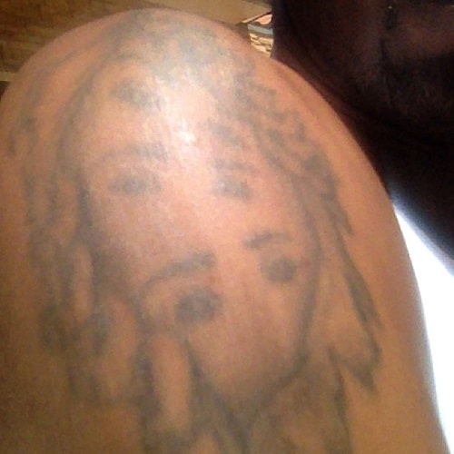 Ralph Tresvant's children eye tattoo on his shoulder. 