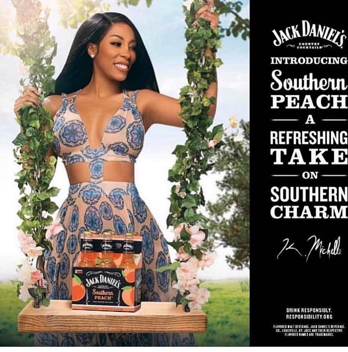 K.Michelle promoting Jack Daniels.