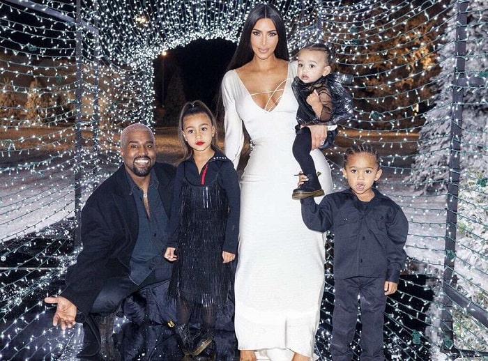 Kim k and Kanye West with their children.