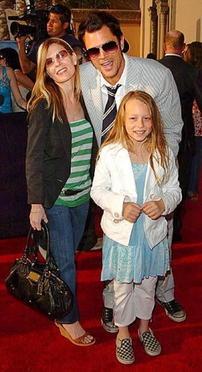 Johnny en Melanie met hun dochter Madison.Johnny en Melanie met hun dochter Madison.