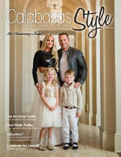 Jay and his children and wife featured in the cover of a magazine.