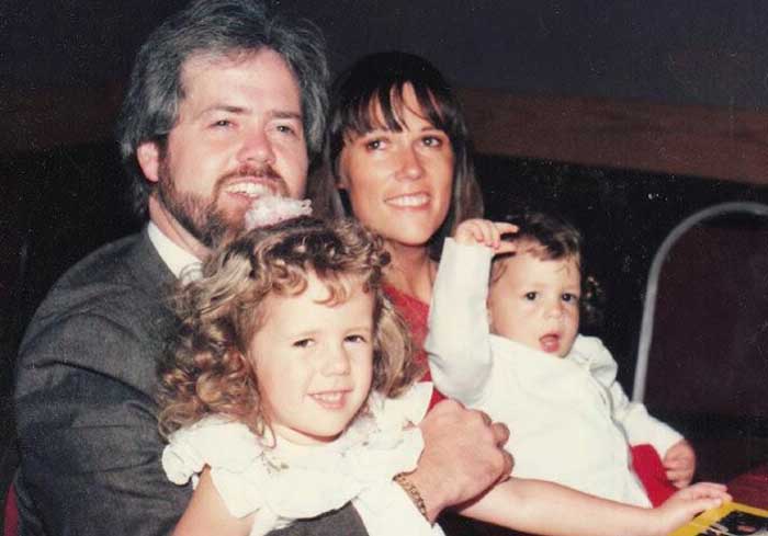 Marrill Osmond taking picture with his wife Mary Carlson and children.