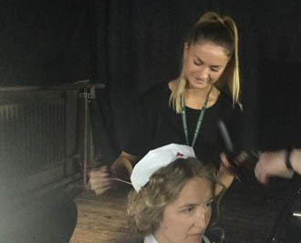 Louise Coles got caught on camera while doing hair job.