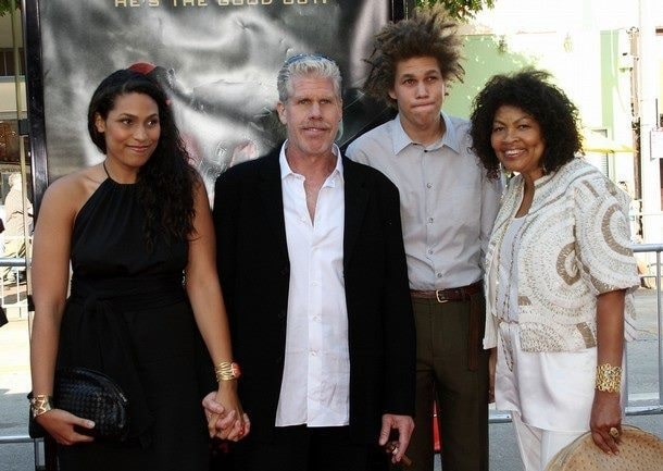 Brandon with his parents and elder sister.