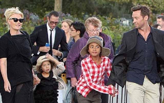 Oscar with his parents and little sister.