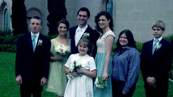 Michael with his siblings on his parents wedding.