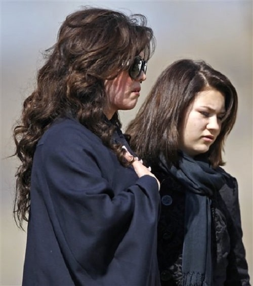 Michael's mother and sister on his funeral day.