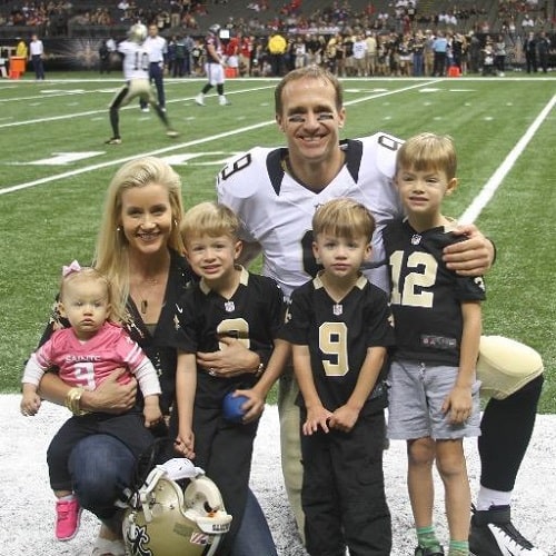 Rylen with her mommy and three brothers on her daddy's game day.