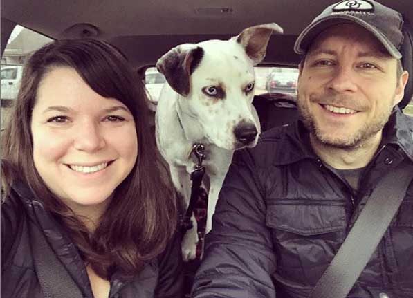 Ellen Hamilton poses with her boyfriend and dog.