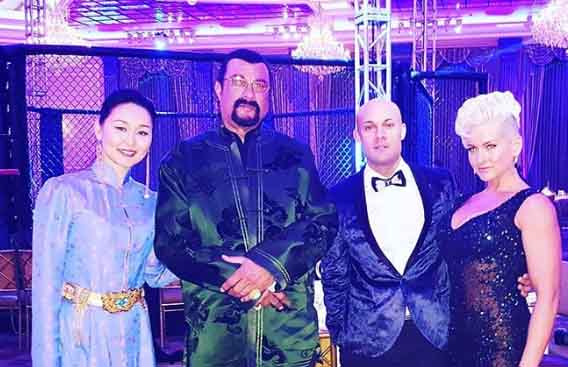 Erdenetuya Seagal poses for a picture with her husband and friends.