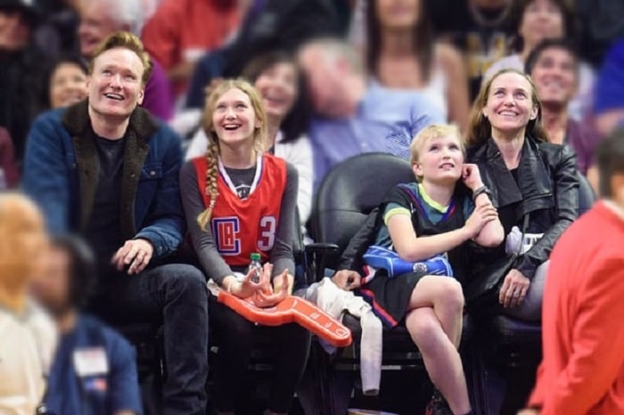 Beckett with his parents and sister, Neve.