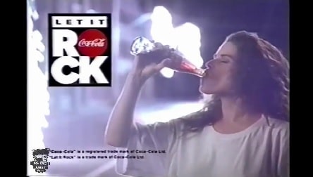 Neve Campbell in the commercial of Coca-Coal.