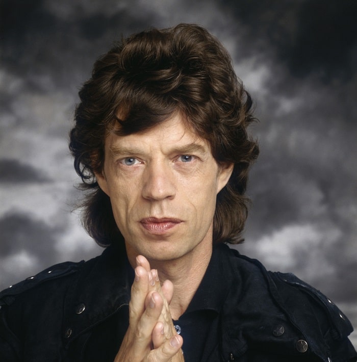 Lucasův bohatý otec, Mick Jagger.