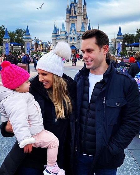 Holly Bankemper's daughter Katie Collinsworth with her husband and daughter.