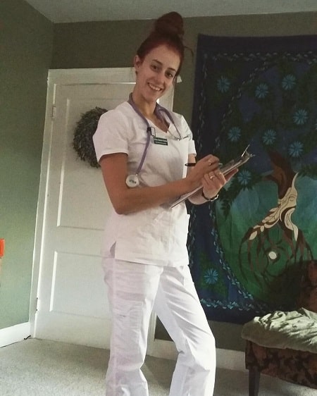 Chloe Reinhart in her nurse uniform.