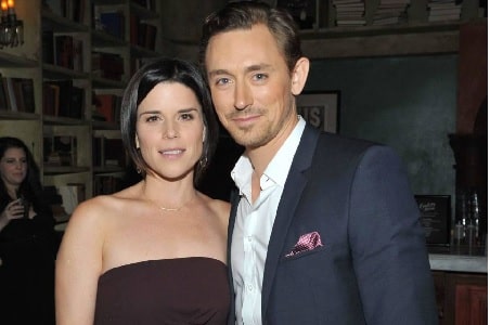 A picture of Caspian Feild parents JJ Feild and Neve Campbell.