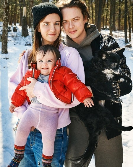 Bowie Rose DeDaan with her parents Dane DeHaan and Anna Wood and their dog Franny. 