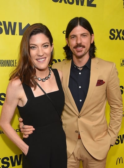 A picture of Isaac Avett parent's Jennifer Carpenter and Seth Avett.