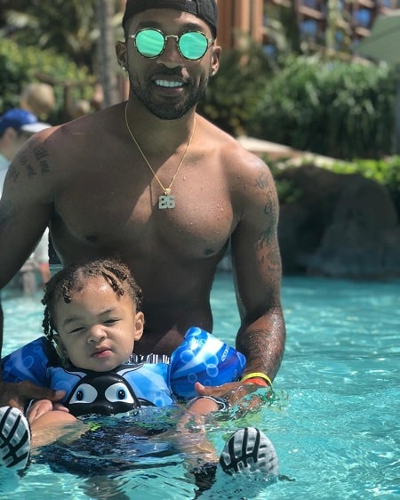 Jru Scandrick with his father Orlando Scandrick in pool.