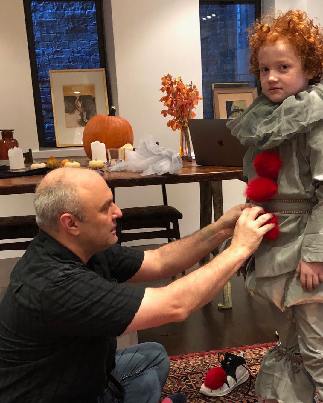  Max Ellington Nixon-Marinoni grandpa, Walter E. Nixon helping him to put on Pennywise dress that he made.