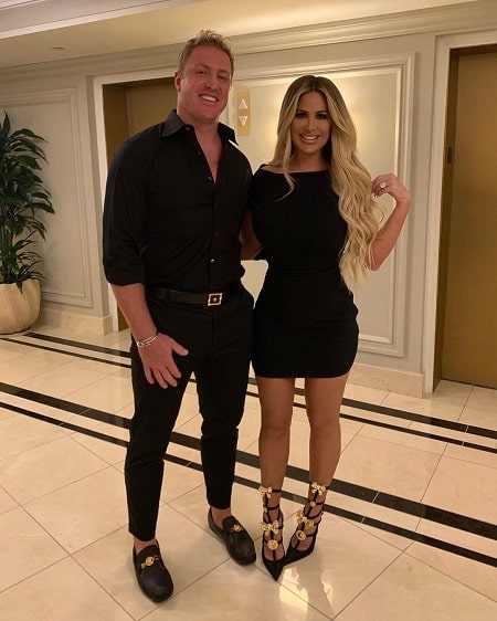 A picture of Kash Kade Biermann parents Kim Zolciak-Biermann and Kroy Biermann. 