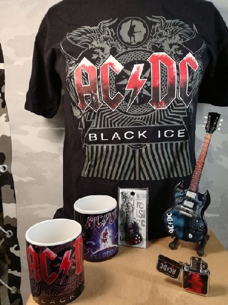 Pictures of AC/DC merchandise like t-shirt, mug, and key chains. 