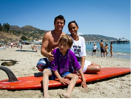 A picture of Kim Bordenave with her husband Jimmy Gamboa and son James Padraig Farrell.