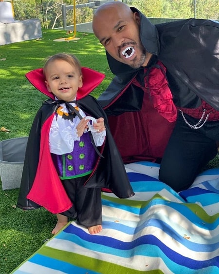 Santiago Enrique Bastón with his godfather Amaury Nolasco in Halloween.