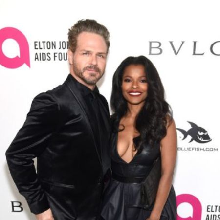 Bradford Sharp with his wife, Keesha Sharp.