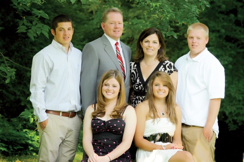 Bobby Petrino with his family doing a photoshoot