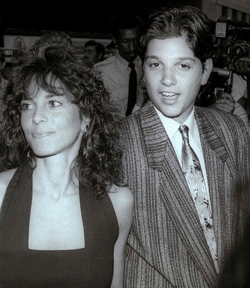 Phyllis Fierro with her husband Ralph Macchio in their 19's where Phyllis is wearing a beautiful black dress  