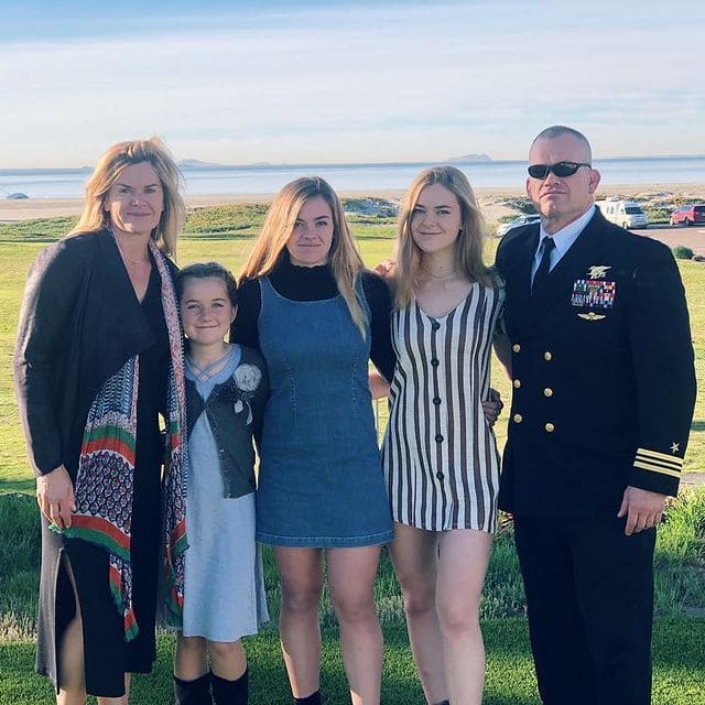 Helen Willink with her family on the occasion of her husband getting a medal 