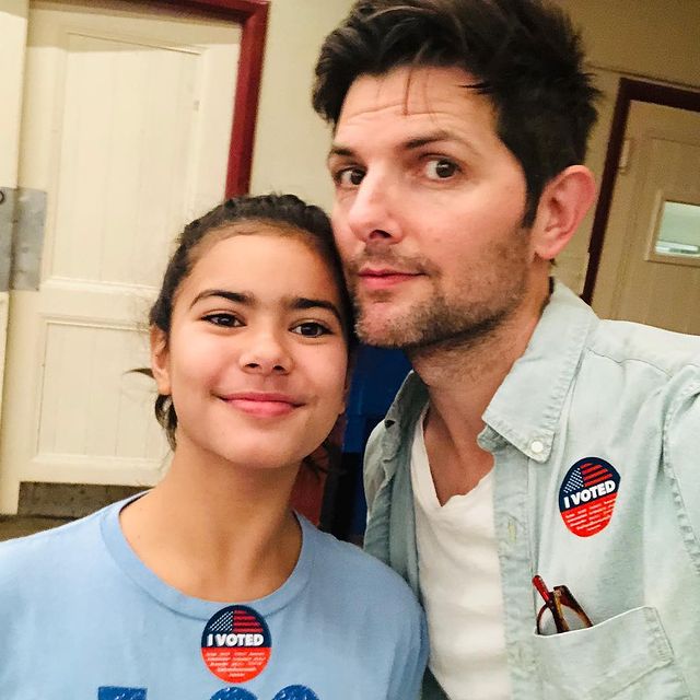 Naomi and her husband Adam with daughter Frankie taking pics after done voting
