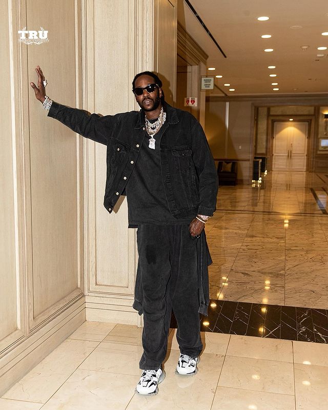 2 Chainz wearing black jeans jacket with black tee and black baggy pants.