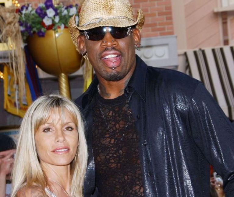 Annie Bakes with his ex-husband Dennis Rodman on a party wearing a white crop top