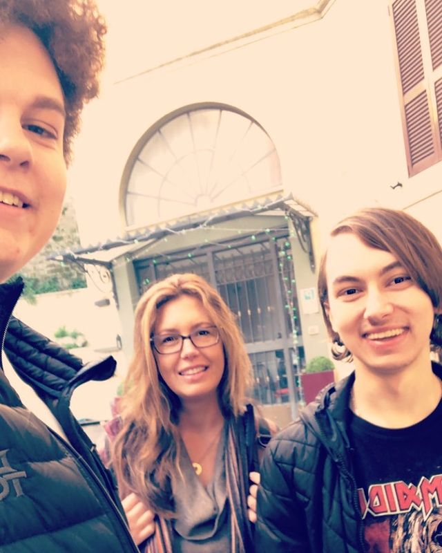 Hayden Byerly with his family enjoying his holidays wearing a casual t-shirt and black jacket