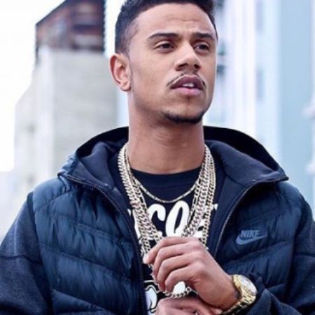 Lil' Fizz looking good with gold chain and gold watch.