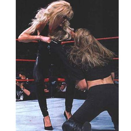 Photo of Turk's mother, Sable wrestling with the opponent. 