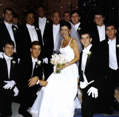 Peyton Manning and his wife, Ashley Thompson during their wedding ceremony with other guests.