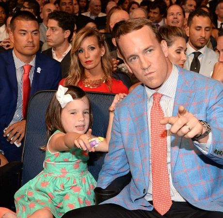 Mosley Thompson Manning attending an event with her father, Peyton Manning.